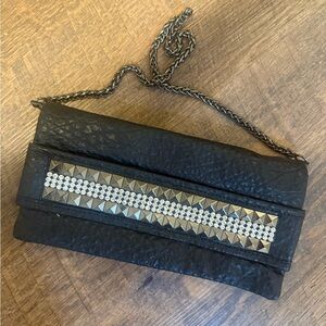 Express Black Clutch with Gold and Silver Accents